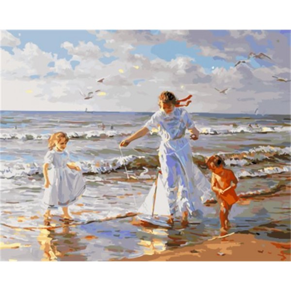 A Mother Playing with Children by the Beach